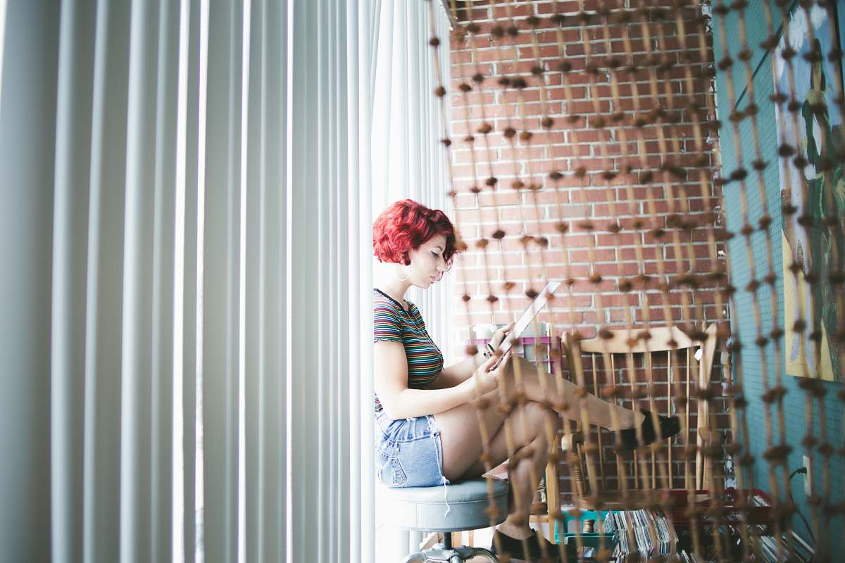 chesterton woman sitting on gray floor united states